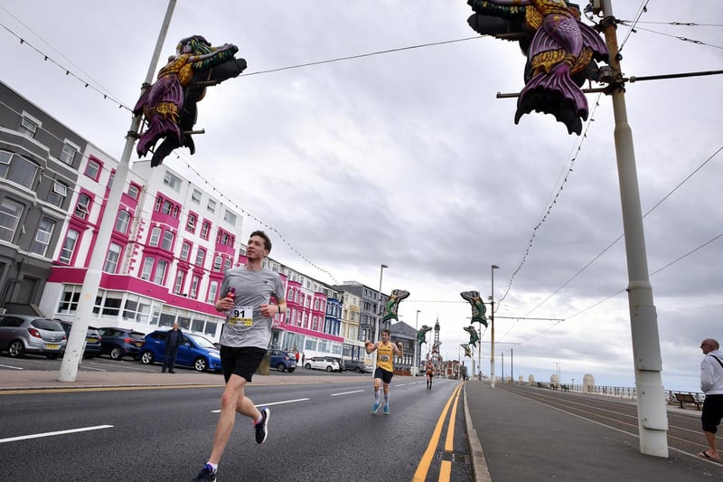 Runners take part in the Blackpool Half and full marathon along the promenade in Blackpool on Sunday.