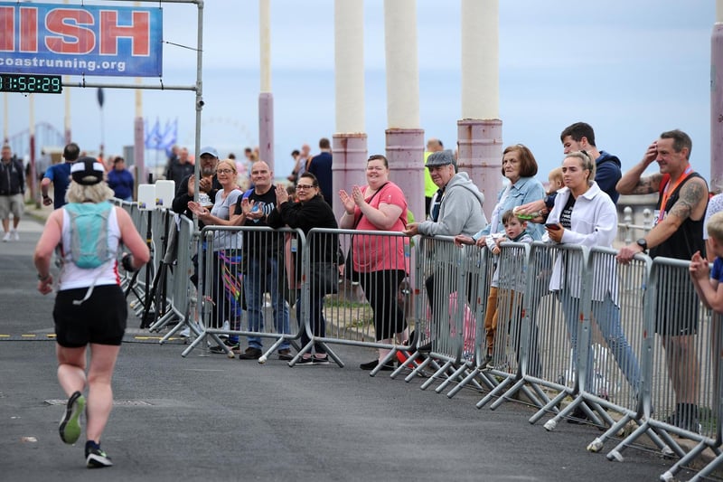 Runners take part in the Blackpool Half and full marathon along the promenade in Blackpool on Sunday.