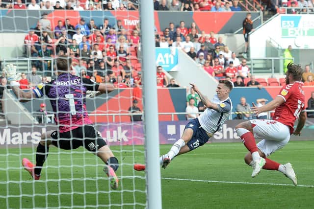 PNE striker Emil Riis slips as he shoots and sees a chance go begging