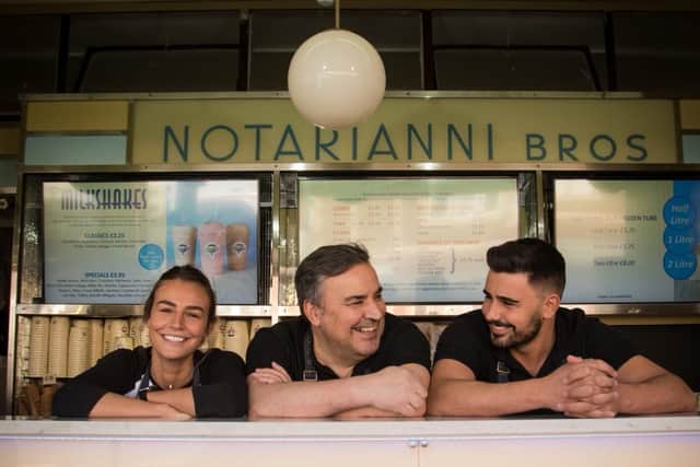 Luca with his dad Michael, 62, and sister Maddalena, 26 at Notrianna Ices, Blackpool.