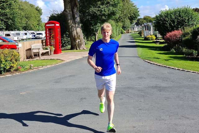 Neil Darby, who has been a councillor for seven years, is running the marathon for his constituency's local community centre, Intact.