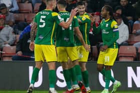 Preston North End players celebrate their first goal against Sheffield United at Bramall Lane