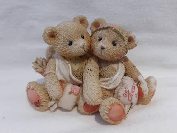 This cute pair of Cherished Teddies cupids were made in 1994 and are on sale for 12 pounds