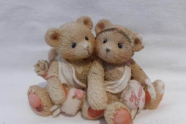 This cute pair of Cherished Teddies cupids were made in 1994 and are on sale for 12 pounds