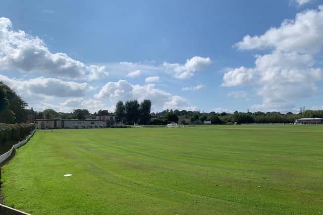 The cricket pitch and club house at the Vernon Carus facility