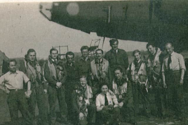 Henryk Drozdz’s air crew. Jan Kozicki stands behind the crouching WAAF, while Henryk is at her left shoulder