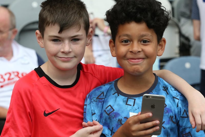 These two young PNE supporters are all smiles before kick-off at Deepdale