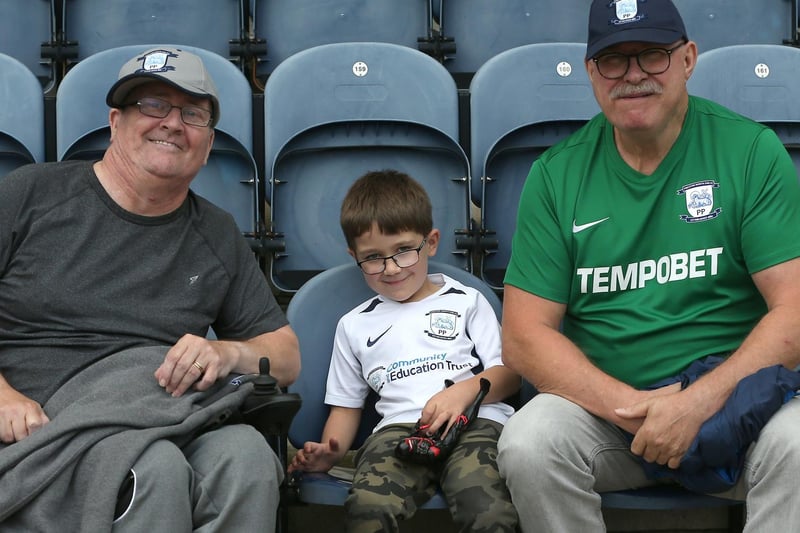 These three PNE fans get ready for the game against West Brom
