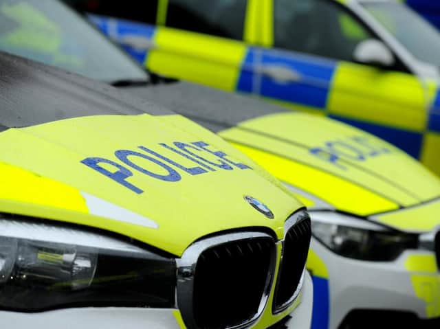 A gang of men wielding 'weapons' tried to force their way into a home in Blackburn early this morning, but were arrested after a police chase on the M61