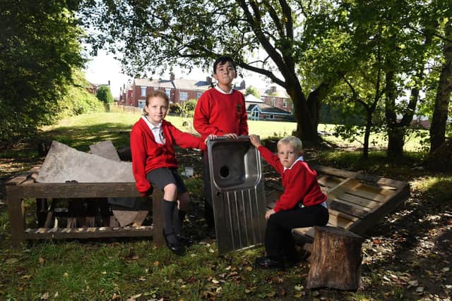 Pupils at Roebuck Primary School in their now destroyed outdoor classroom.