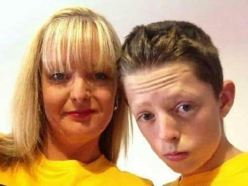 Dylan Crossey with his mum, Tracey Milligan