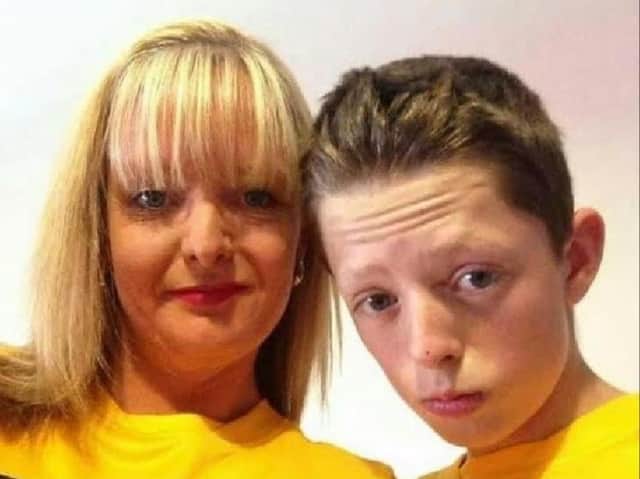 Dylan with his mum Tracey.