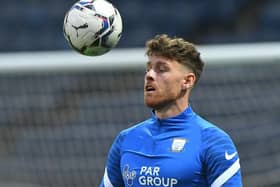 Connor Wickham warms-up ahead of Preston North End's clash with Cheltenham Town at Deepdale