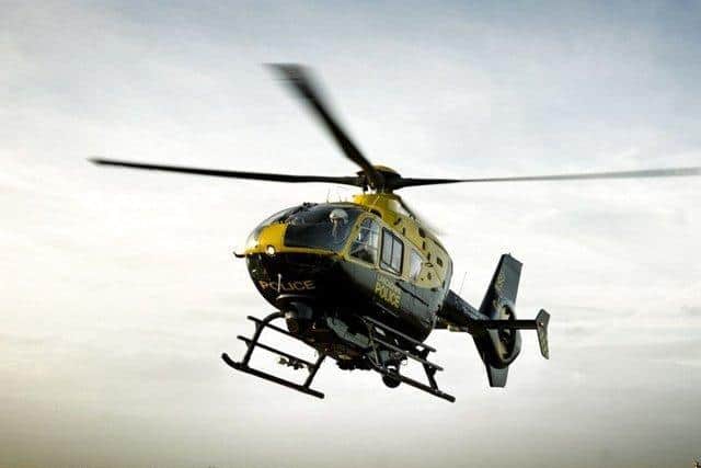 An unknown man helped direct a police helicopter to a missing woman's location near the M61.