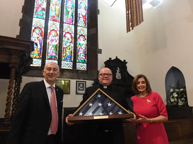 Sir Lindsay Hoyle with rector of St Laurence’s Church, Chorley, the Father Neil Kelley, receiving an American flag from Nancy Pelosi, Speaker of the US House of Representatives during the G7 Speakers Conference in Chorley.
Photo: Jessica Taylor