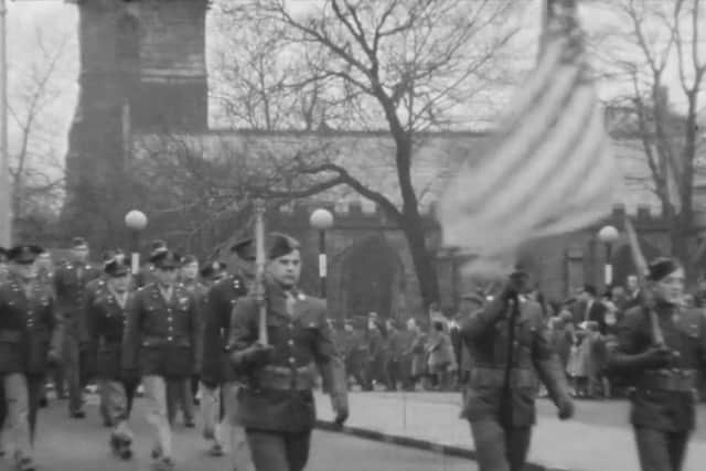 Original US flag is paraded through Chorley during the Second World War Picture: North West Film Archive at Manchester Metropolitan University
