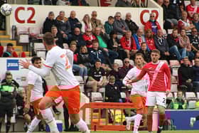 Morecambe full-back Ryan Cooney sits out tomorrow's game through suspension