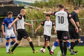 Ewan Bange (left) after scoring from the spot for Brig (photo: Ruth Hornby)