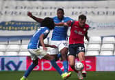 North End’s Josh Earl in action with Birmingham City’s ex-PNE loanee Chuks Aneke