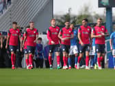 The Preston North End team come on to the pitch at St Andrew's