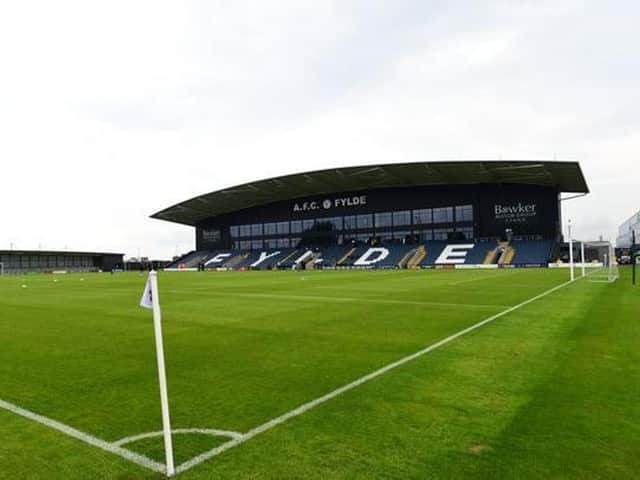 AFC Fylde has apologised after a number of its academy players allegedly squirted water pistols at members of the public in Kirkham