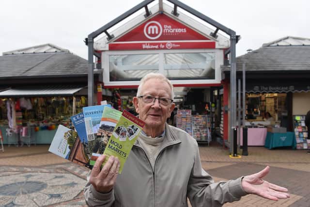 Graham Archer with examples of the kind of guides produced by other market towns and from which he believes Chorley could benefit (image: Neil Cross)