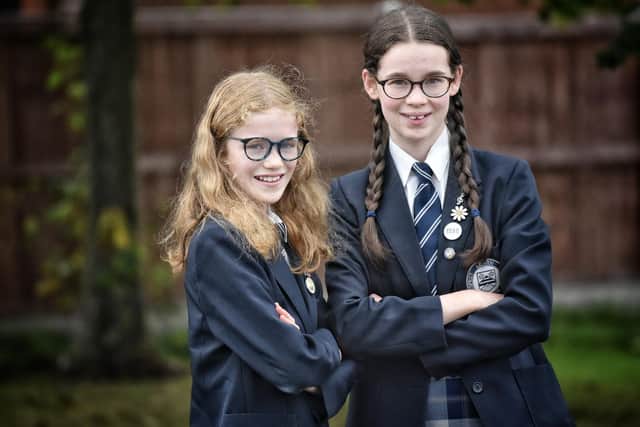Local pupils  Nia and Daisy Williams who played a key part in the campaign to reduce plastic use in Longridge. Posters they created were displayed around the town.