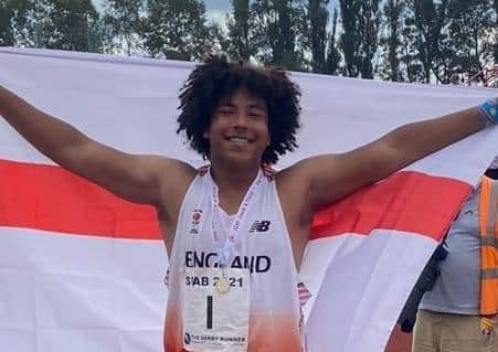 Isaac Delaney celebrates his gold medal