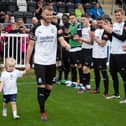 Chris Marlow, with his daughter Heidi, is given a guard of honour on to the pitch before his final game for Bamber Bridge (photos: Ruth Hornby)