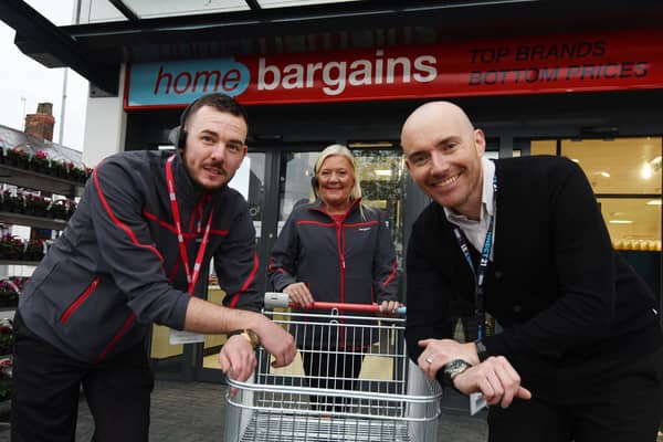 Happy to help - Staff members, from left, store manager Jordan Gillman, Amanda Firth and area manager Daniel Wilding outside the store