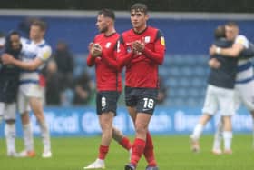 Preston North End midfielders Ryan Ledson and Alan Browne applaud the fans at the final whistle following defeat to QPR