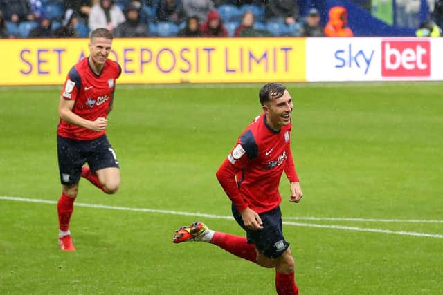 Josh Earl runs to celebrate North End's second goal against QPR