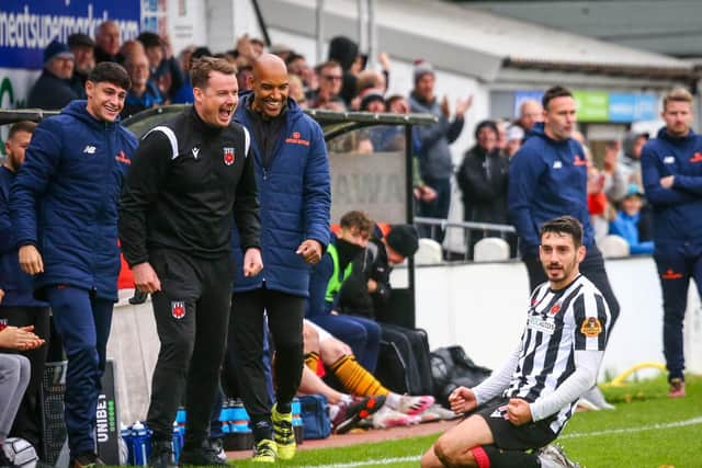 Jon Ustabasi celebrates his goal in front of the Chorley dugout (photo:Stefan Willoughby)