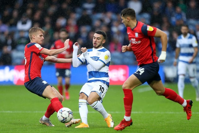 Ali McCann and Jordan Storey challenge QPR's  Ilias Chair