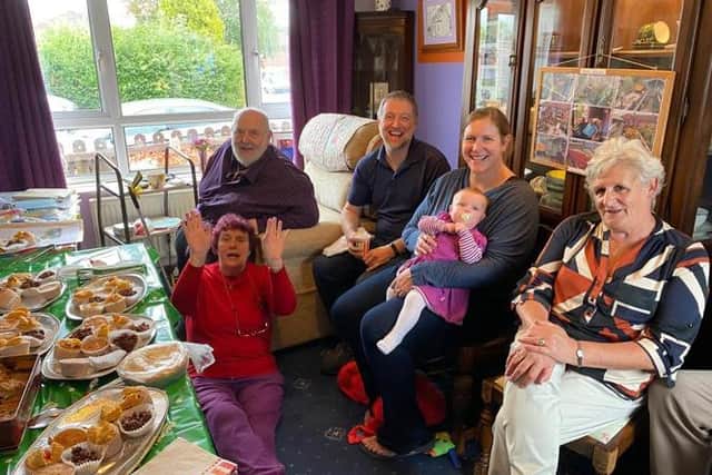 Joe, pictured far left, enjoying a get together at the Macmillan coffee morning