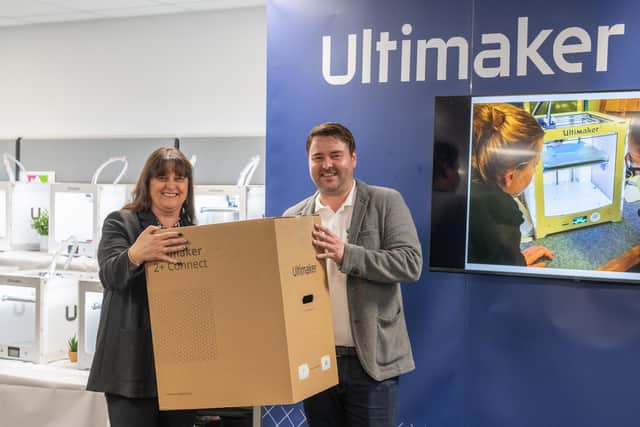 The first of the 3D printers is handed over as part of the project to Patricia Berry, Careers Leader at Parklands High School by Paul Croft, Founder of CREATE Education