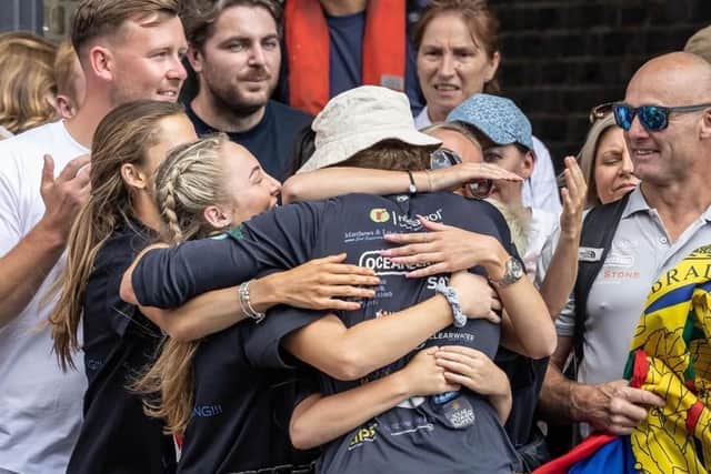 Jordan Swift hugs his family for the first time in more than three months after rowing across the Atlantic