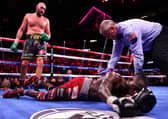 Tyson Fury (top) knocks out Deontay Wilder in the 11th round (photo: Getty Images)