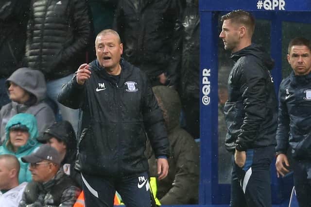 Preston North End head coach Frankie McAvoy and coach Paul Gallagher on the touchline at QPR