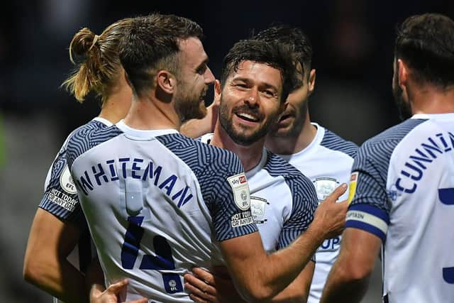 Preston North End's Joe Rafferty is congratulated after scoring against Cheltenham