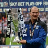 Former Preston North End manager Simon Grayson with the League One play-off final trophy at Wembley in May 2015