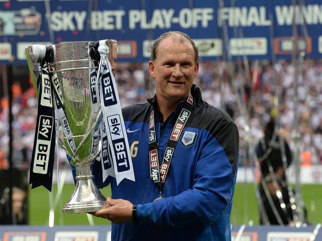 Former Preston North End manager Simon Grayson with the League One play-off final trophy at Wembley in May 2015