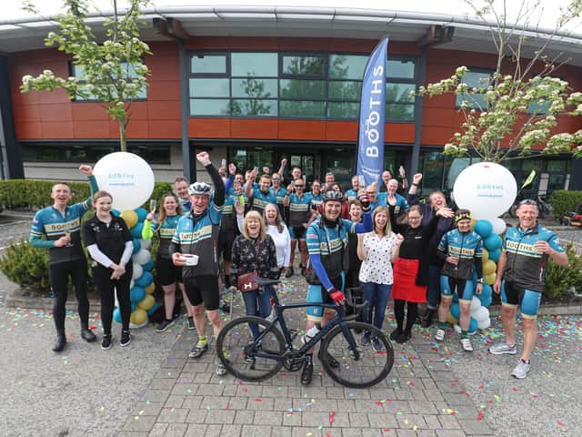 Nigel Murray and his team after completing the Tour De Booths bike ride. Picture by Paul Currie, www.paulcurrie.co.uk