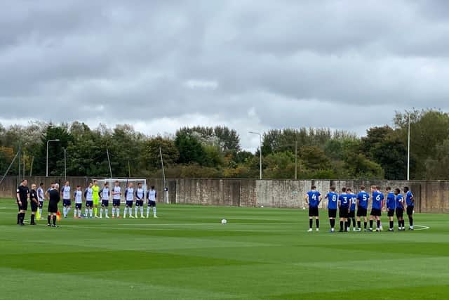Preston North End and Rochdale players observe a minute's silence at Euxton     Pic by Tom Sandells