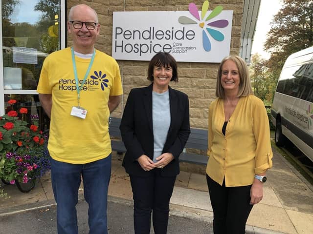 Lancashire County Council leader Phillipa Williamson (centre) is welcomed by Pendleside Hospice’s chairman of trustees David Brown and chief executive Helen McVey.