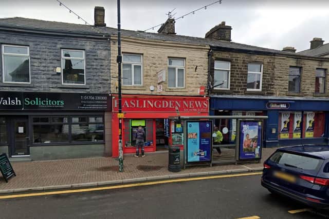 The robbery occurred inside Haslingden News in Manchester Road (Credit: Google)