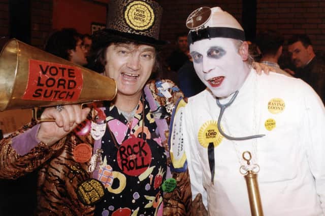 Screaming Lord Sutch and his election agent pictured at the count in February 1998.