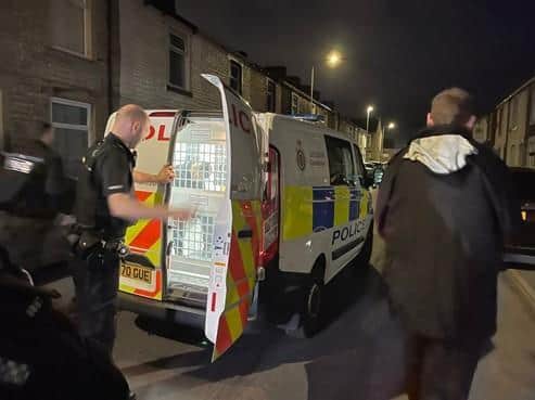 25 people were charged, including four people who were arrested on (October 13) following a series of dawn raids (Credit: Lancashire Police)