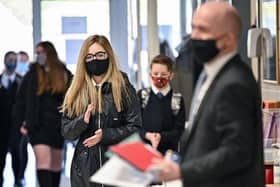 Staff and students at Preston College are being asked to wear face masks again.