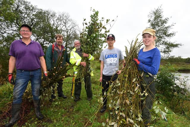 Ribble Rivers Trust volunteers join members of Grimsargh Wetlands at the volunteer day -  from left, John Willan, Mike Fisher, Geoff Carefoot, Harold Leung and Leanne Tough.